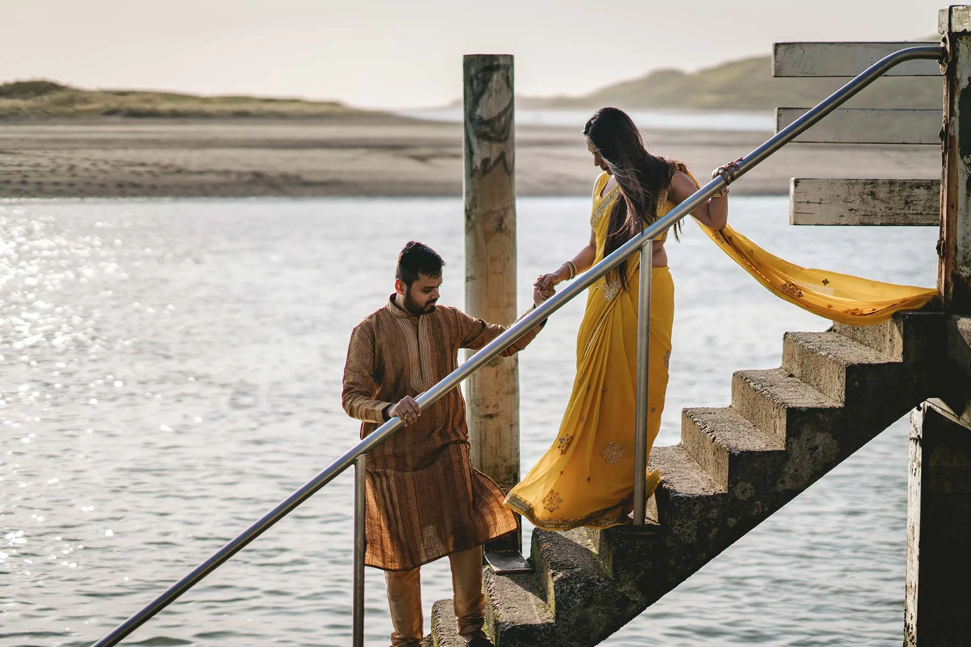 Raglan engagement couple coastal steps