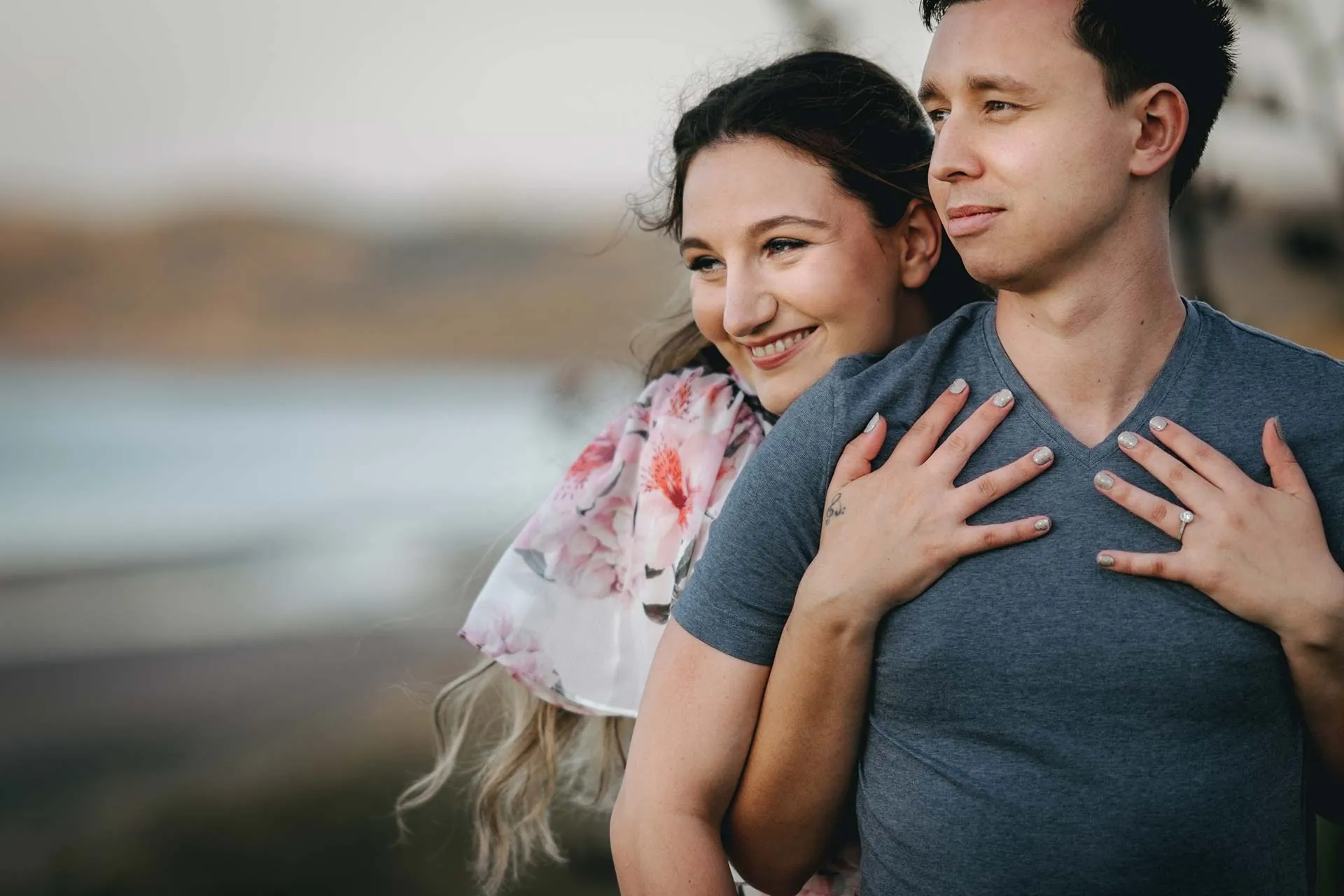 Raglan engagement couple piggyback portrait