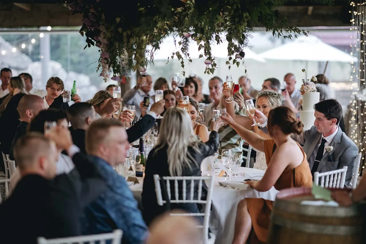 Red barn Karapiro wedding reception guests