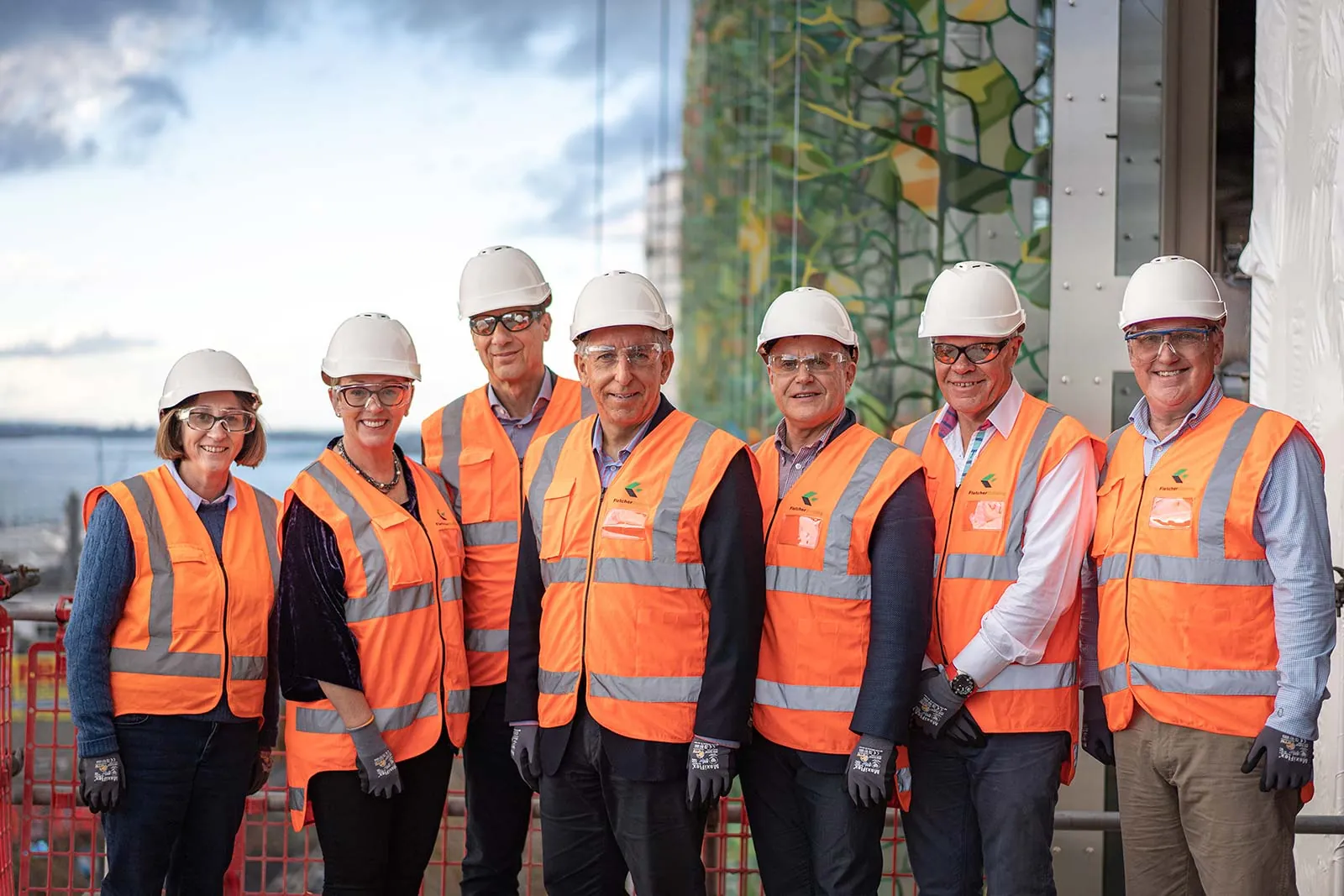 Construction leadership team in high-visibility clothing