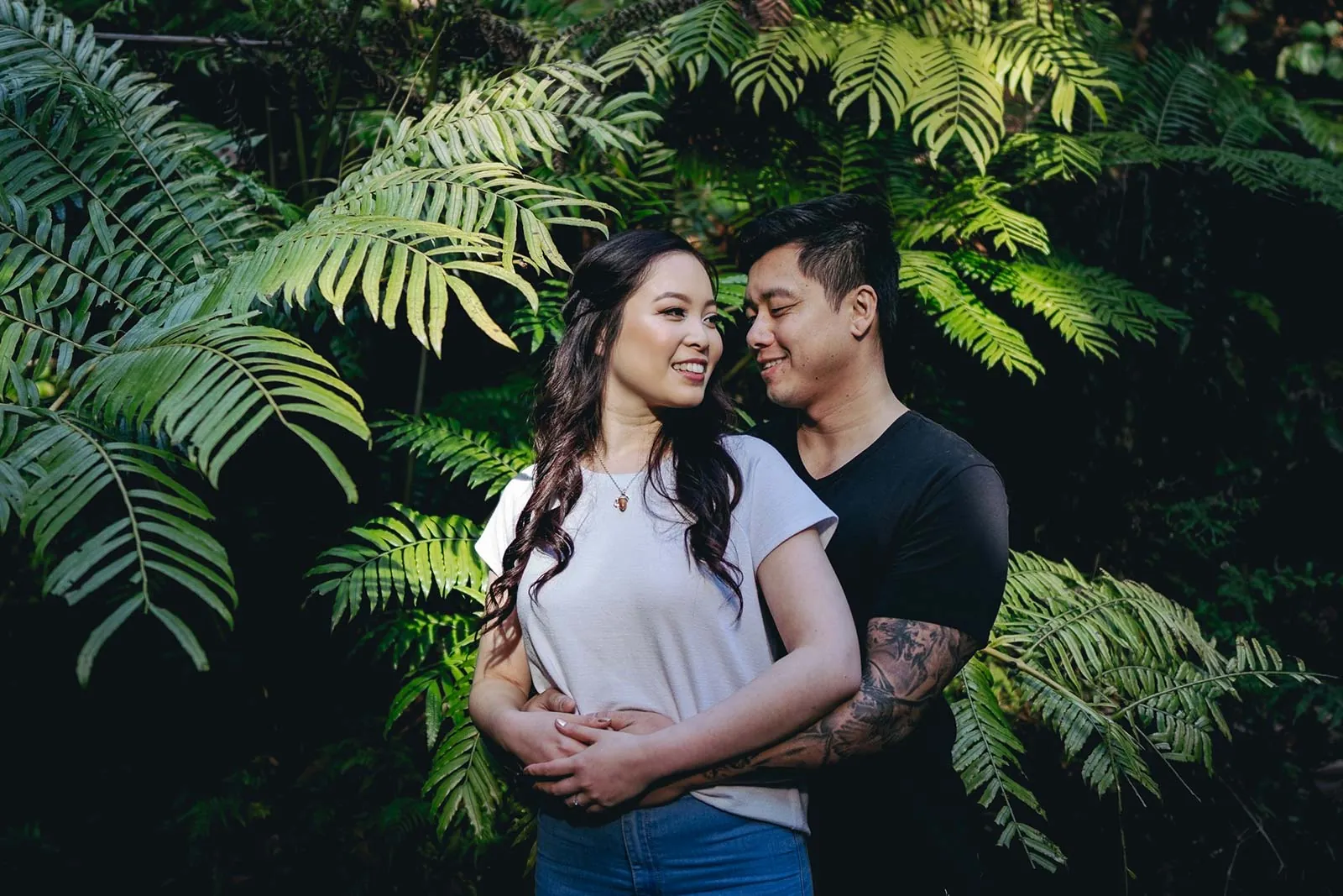 Couple portrait among native New Zealand ferns