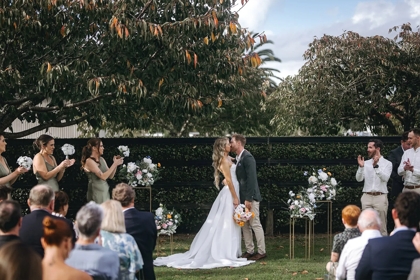 Outdoor garden wedding ceremony in New Zealand